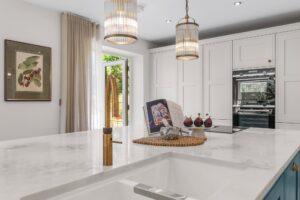 Green & Neutral In-Frame Kitchen in Lower Broadheath
